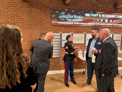 This young Cpl explaining her style of marksmanship to some old Devil Dogs.