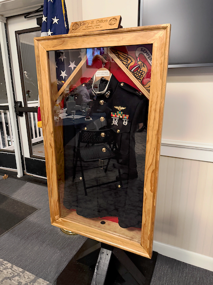 The Dillon Detachment displays the uniform of Capt Dillon next to the Missing Man Table, to honor him and all MIA and POW’s.